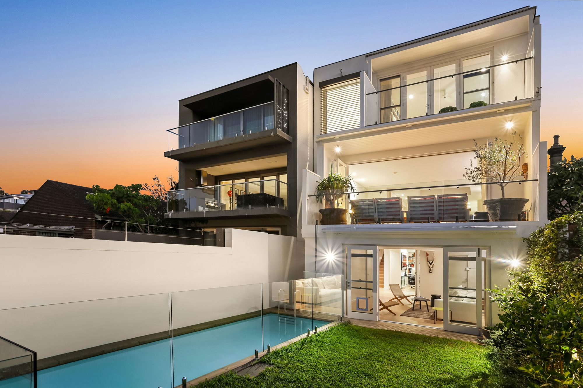 Luxury home built by Coluccio Construction in Sydney at dusk